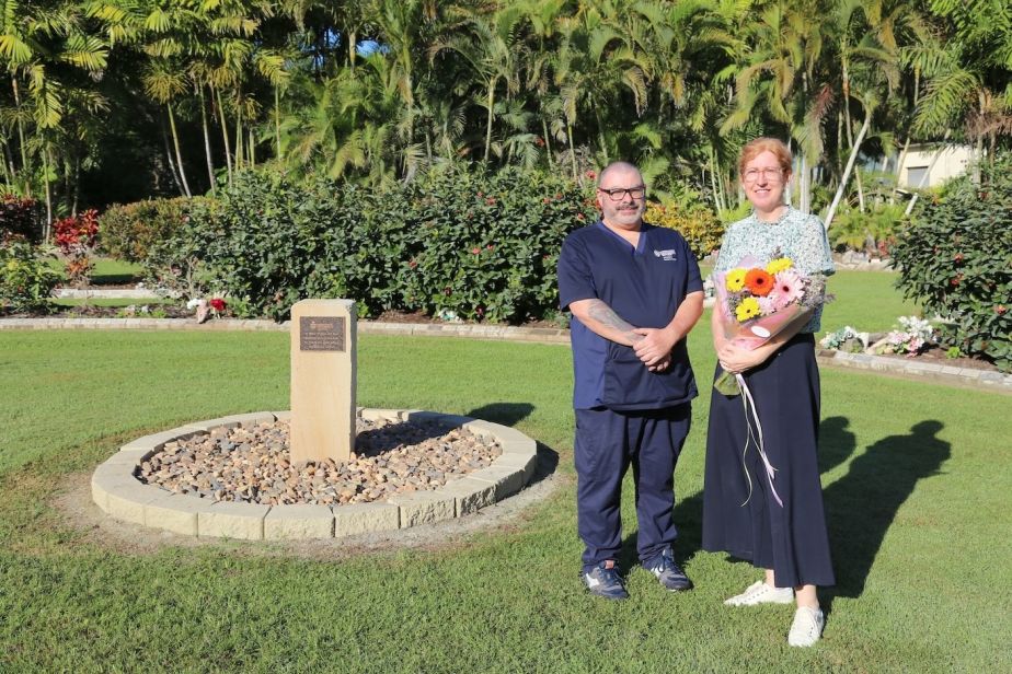 JCU Human Bequest Coordinator Rod Cook with JCU School of Anatomy custodian Professor Kate Domett stand next to the plaque commemorating donors 