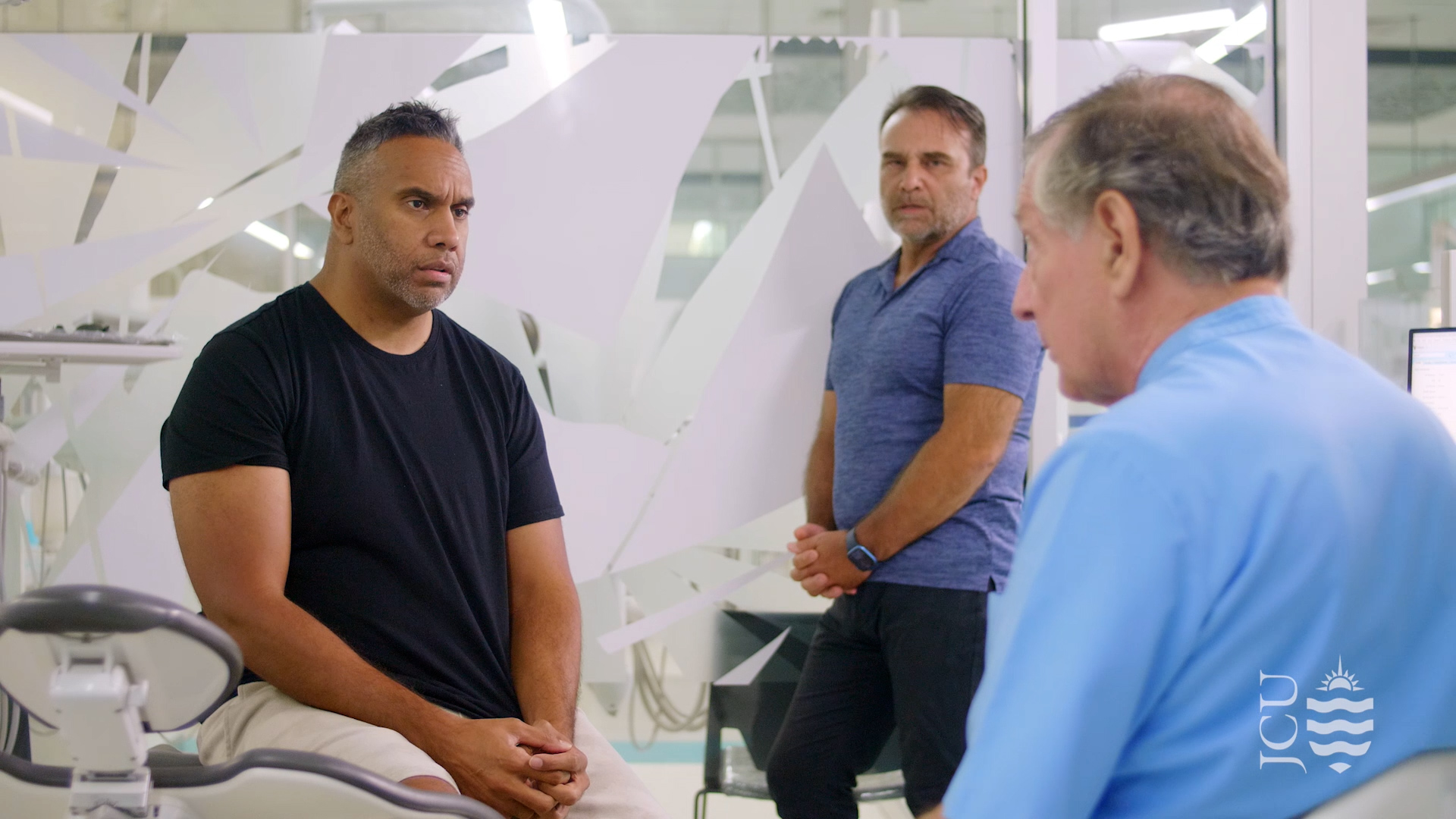 man talking to dentist. 