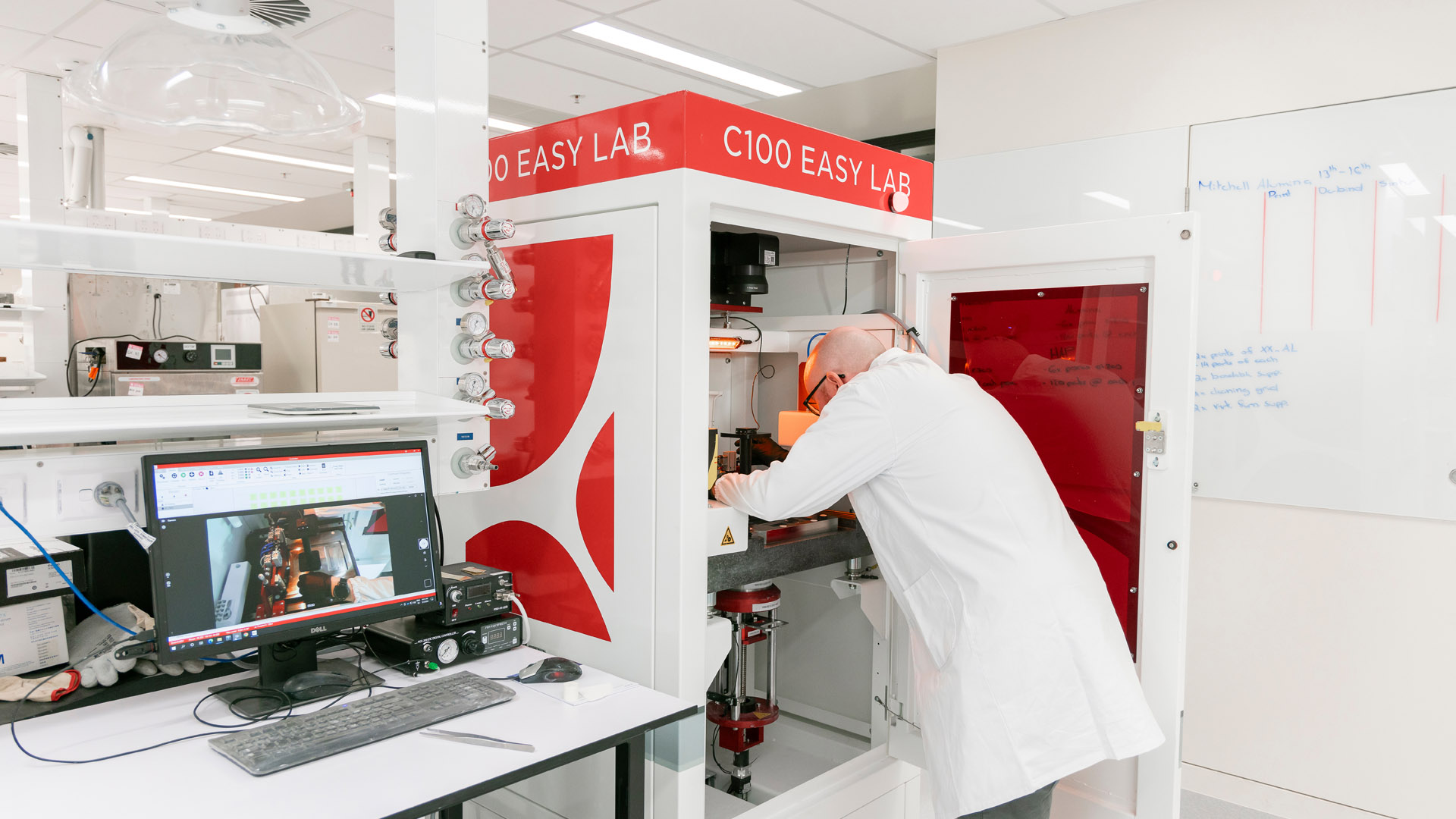 A JCU laboratory with a machine being used. 